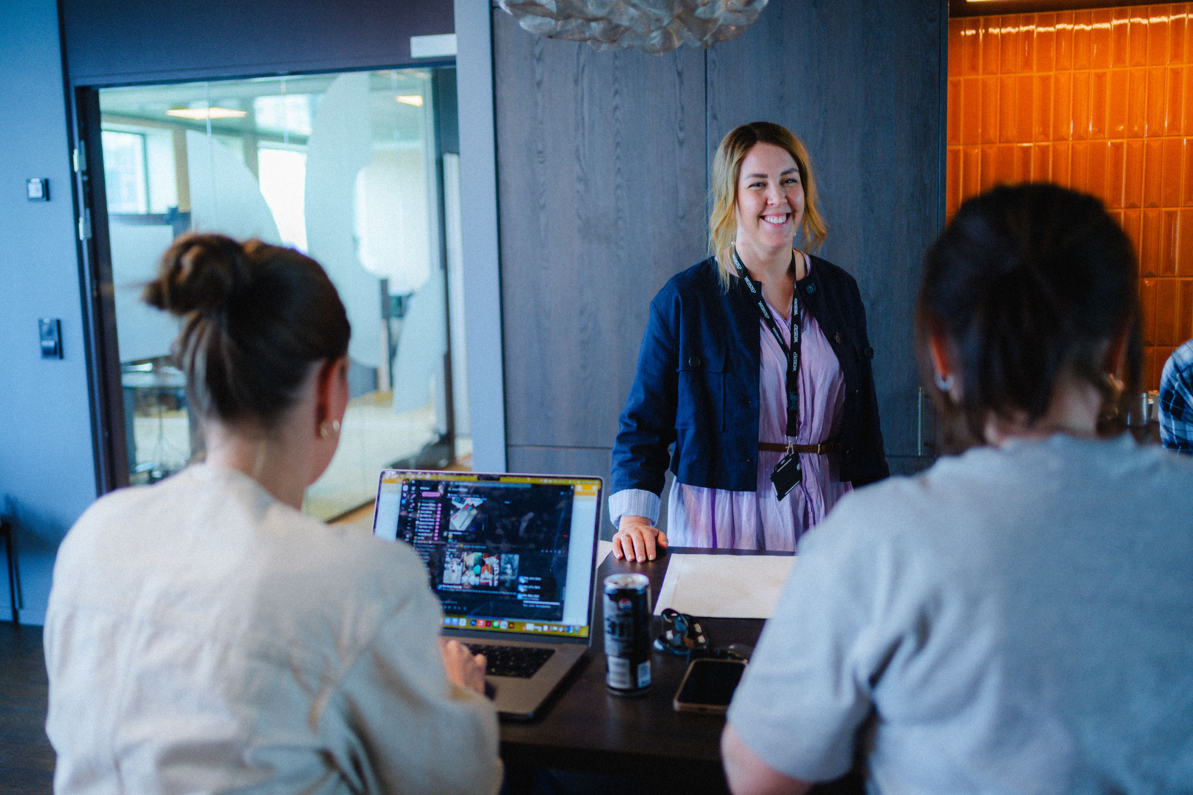 two women sitting on chair